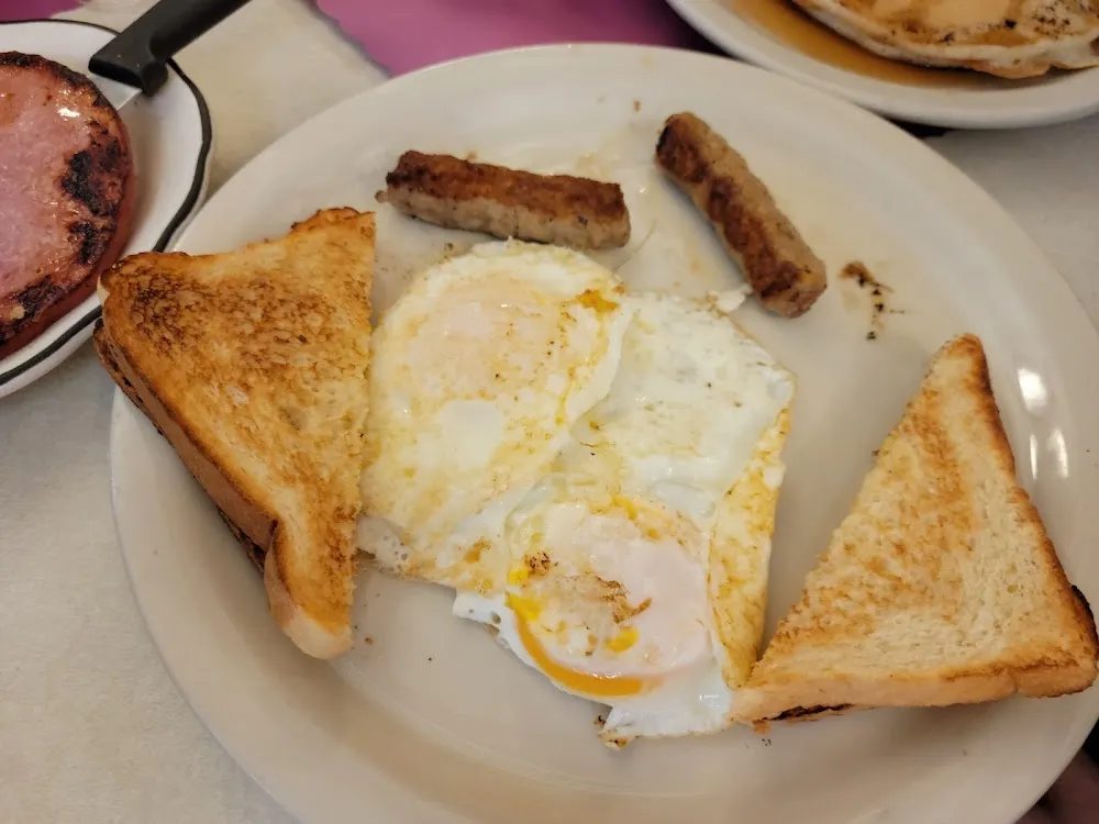 Eggsover Easy Corned Beef Hash Bacon Home Fries White Toast